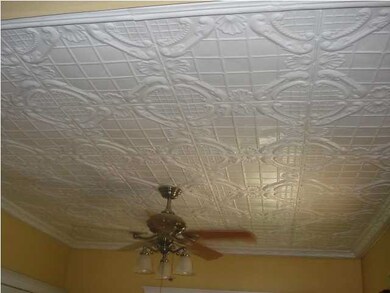 Living room tin ceiling.
