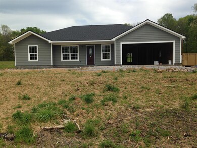Great Quality construction. Fiber cement board siding with archetectual shingle roof and covered front porch. Picture is of a similar home.