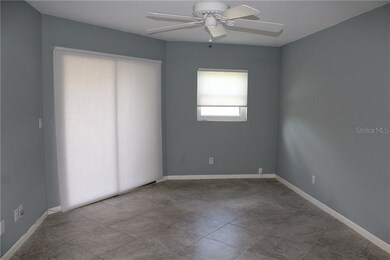 Master bedroom has sliders that open to the Florid