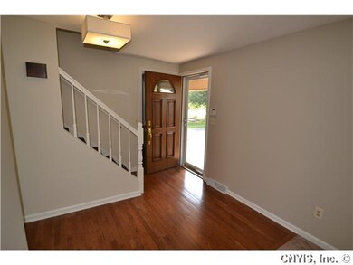 Foyer. Entryway welcomes you with dark, shining ha