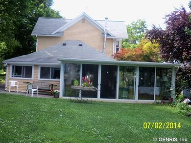 Exterior Back rear of home with patio and 3 season