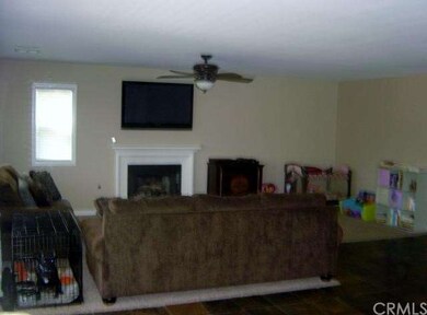 Family room with gas/wood burning fireplace!
TV  M
