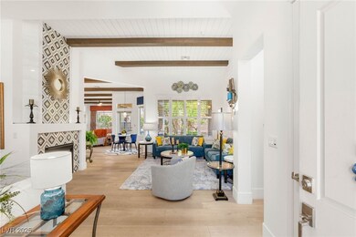 Living room featuring wood finished floors, wooden