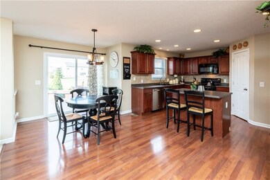 What a great floorplan - Kitchen & Dining Area showcase durable laminate flooring.