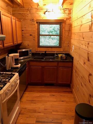 Kitchens feature granite countertops and appliance