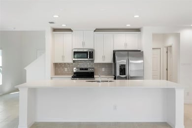 1365 Sawgrass Hammock Ln, Davenport, FL 33837 - photo 2