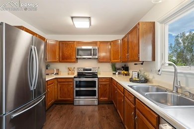 Kitchen comes complete with a great view to the ba