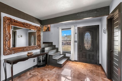 Entry w/ half bath & staircase