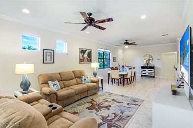 Generous Living area featuring a Crown Molding, Ne