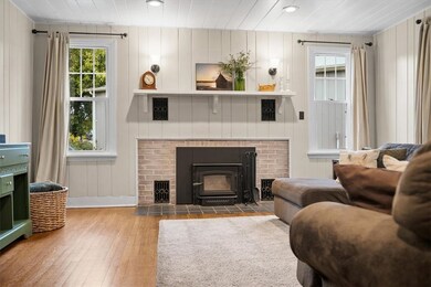 The beautiful wood burning fireplace gives a cozy