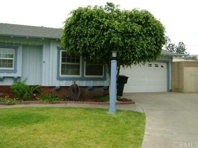 Exterior view of dining room window and 2-car gara