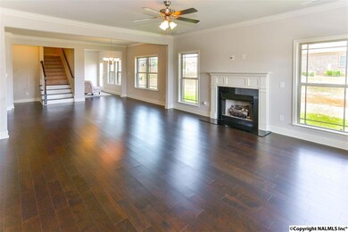 Hardwood flooring throughout this open plan.  Natural gas fireplace