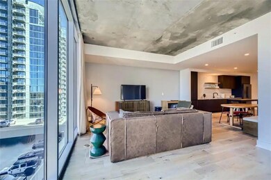 Living area with light wood-type flooring