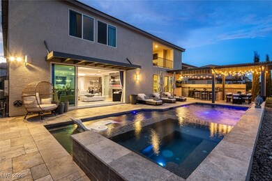 View of swimming pool with a fenced in pool, outdo