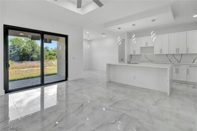Unfurnished living room featuring a ceiling fan, m