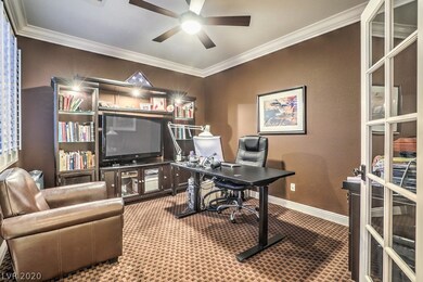 French door entrance into office with crown moldin