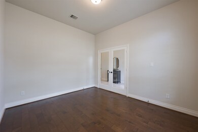 The at-home professional will appreciate the privacy in the study provided by French doors. Here you'll find wood floors, neutral paint, fantastic natural light and plenty of room for large furnishings.