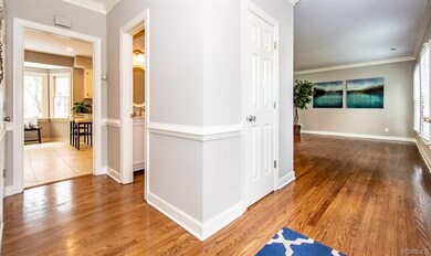 Entry foyer looking into the living room and kitch