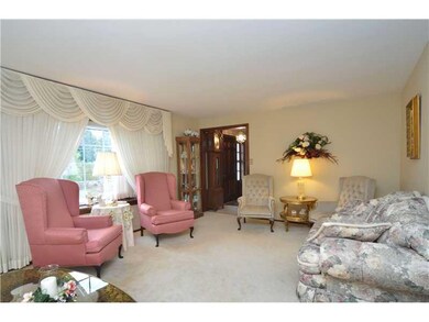 Living Room. The living room includes a bay window
