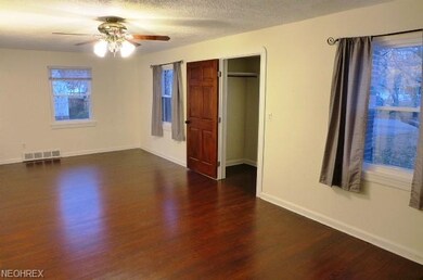 Newer floors and doors and updated windows allow y
