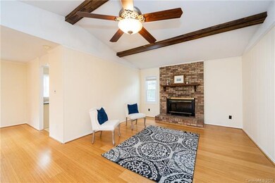Spacious family room/den area with gas logs fireplace!