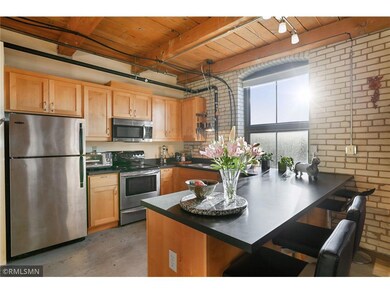 The large window in the kitchen brings in so much 