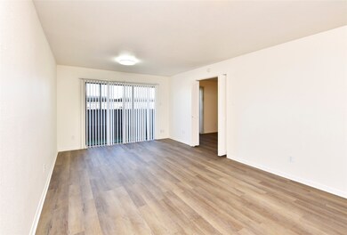 Bright and spacious living room with a new vinyl-p