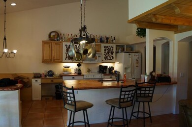 kitchen with tile counters and island