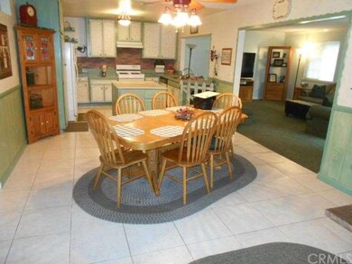 Country Kitchen with large tile flooring