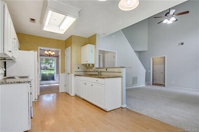 Eat in kitchen with granite counters, back splash 