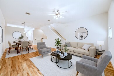 Virtually staged living and dining rooms to help envision the comfort and livability of this home.