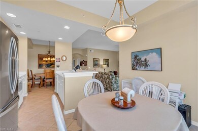 Dining room featuring light tile patterned floorin