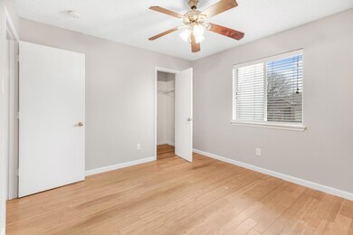 Unfurnished bedroom with light hardwood / wood-sty