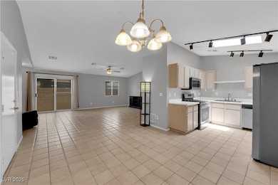Kitchen featuring stainless steel appliances, ceil