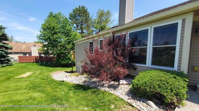 7230 Creekside Dr unit 64, Lansing, MI 48917 - photo 2