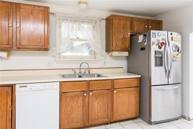 Tiled kitchen with newer appliances
