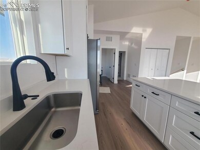 Photo of kitchen from similar home build.
