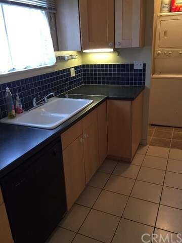 Bright Kitchen with Plenty of Cabinets.