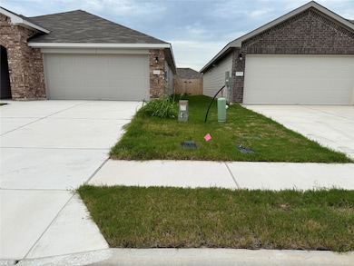 View of front of house featuring brick siding, dr