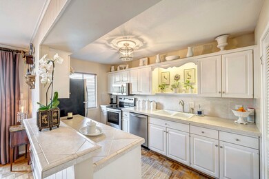 Fantastic kitchen with neutral countertops,a break