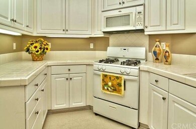 Bright kitchen with lots of cabinet space.