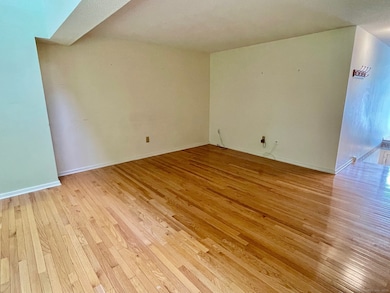 Hardwood flooring throughout the unit