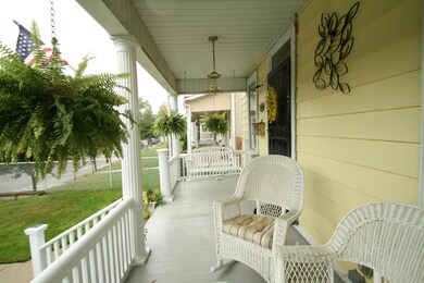 Relax on your long stretch of porch