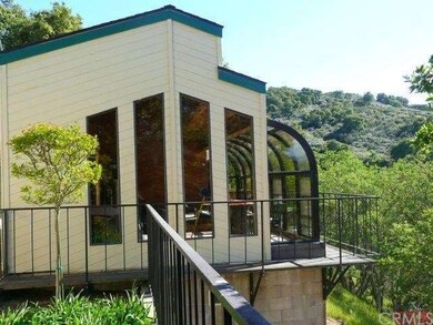 Sun Room Retreat with views of scenic oak covered 