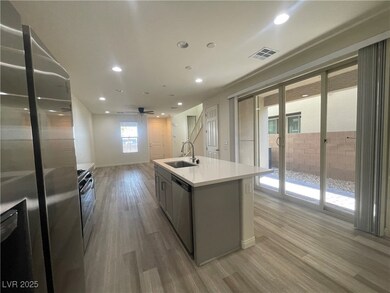 Kitchen featuring stainless steel appliances, ligh