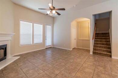 This home features an expansive living area downst