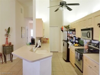 Well lit and well appointed kitchen.