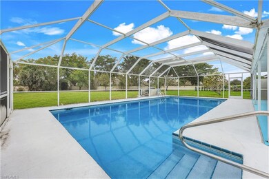 View of swimming pool featuring a patio area, glas