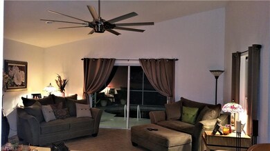 Evening picture of living room!   Beautiful ceilin