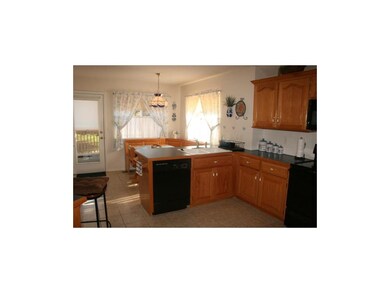 Kitchen opens to breakfast room